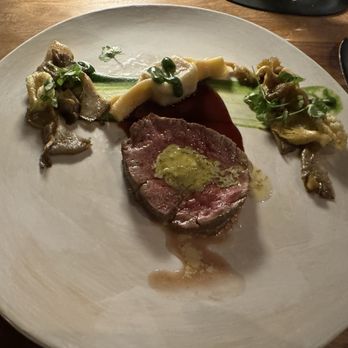 Partage - Beef tenderloin, foie gras ravioli, mushrooms sélection, Café de Paris butter. Sublime! - French Near Me - Las Vegas, Nevada Partage - Beef tenderloin, foie gras ravioli, mushrooms sélection, Café de Paris butter. Sublime! - French Near Me - Las Vegas, Nevada