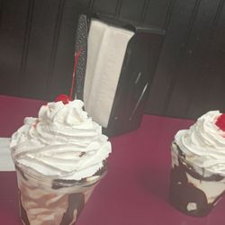 Mimis Icecream& Sweet Treats - We both got soft serve twist hot fudge sundaes. Yummy!