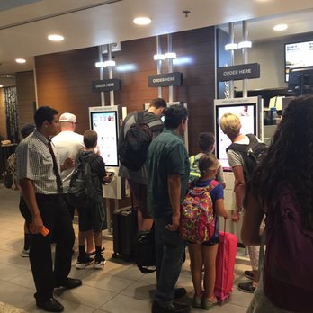McDonald's - This guy stands outside saying hello to people who walk by and helping with automated ordering options - Fast Food Near Me - SeaTac, Washington McDonald's - This guy stands outside saying hello to people who walk by and helping with automated ordering options - Fast Food Near Me - SeaTac, Washington