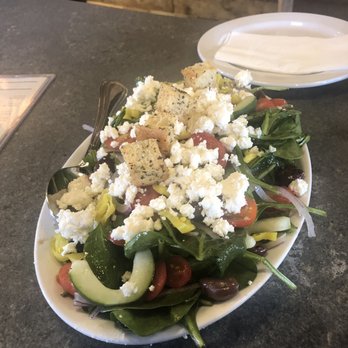 Pies & Pints - "Small" Greek Salad - it could've been a whole meal. Definitely shareable! Shown with spinach due to the recall on romaine lettuce. - Pizza Near Me - Carmel, Indiana