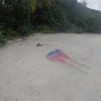 Cinnamon Bay Beach - Sand sculpture lady. - Beaches Near Me