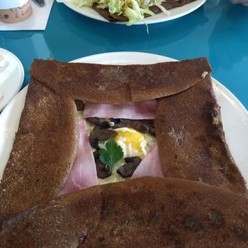 Authentique - La Reine: buckwheat flour (is gluten free), sauteed mushrooms with garlic and herbs, ham, Swiss Cheese and sunny side egg - Creperies Near Me - Simpsonville, South Carolina