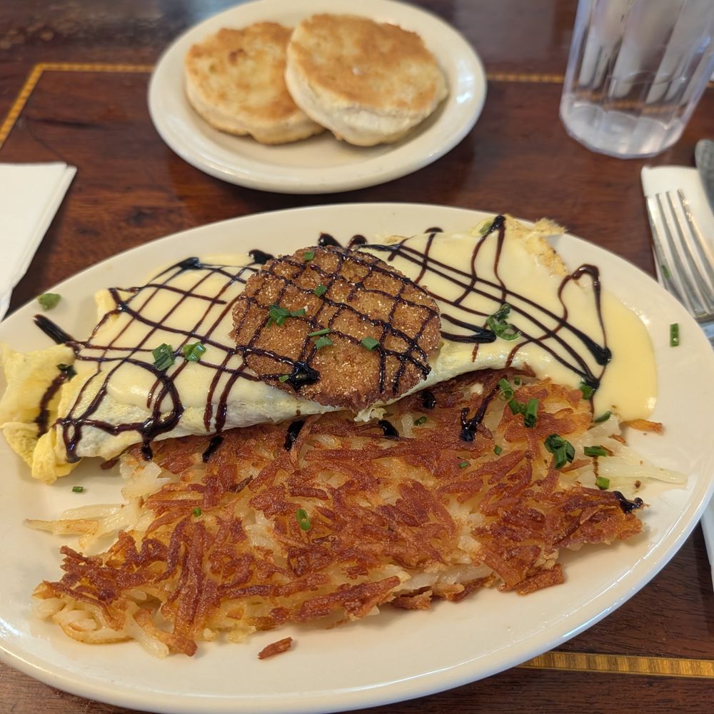 Frank's Diner - Southern Caprese Avo Omelette with fried biscuit. Don't pass on the biscuit, you'll regret it. - Diners Near Me - Spokane, Washington Frank's Diner - Southern Caprese Avo Omelette with fried biscuit. Don't pass on the biscuit, you'll regret it. - Diners Near Me - Spokane, Washington