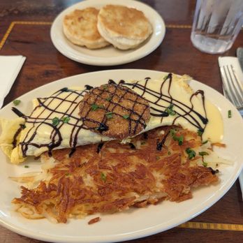 Frank's Diner - Southern Caprese Avo Omelette with fried biscuit. Don't pass on the biscuit, you'll regret it. - Diners Near Me - Spokane, Washington