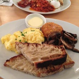 Scrambled eggs with hash brown and sautéed mushrooms Scrambled eggs with hash brown and sautéed mushrooms
