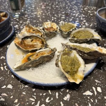 Hog Island Oyster Co - Grilled Oysters - (green) tomatillo flavor, (red) chipotle flavor - Seafood Near Me - Napa, California Hog Island Oyster Co - Grilled Oysters - (green) tomatillo flavor, (red) chipotle flavor - Seafood Near Me - Napa, California