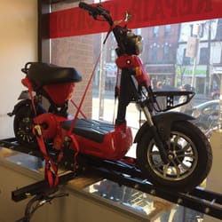 Green Choice Moto - One of our popular bikes attached to a hitch carrier. Perfect for weekend fun.