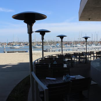 Lighthouse - Downstairs patio with a view of the marina. - Breakfast & Brunch Near Me - Newport Beach, California