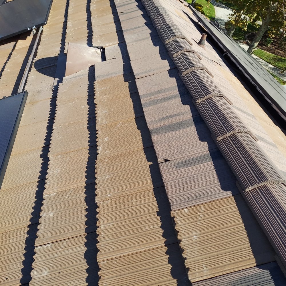 Slide of Huertas roofing