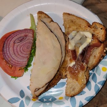 Rumrunners - Turkey, sliver of Brie with bacon sandwich. - Seafood Near Me - Cape Coral, Florida Rumrunners - Turkey, sliver of Brie with bacon sandwich. - Seafood Near Me - Cape Coral, Florida