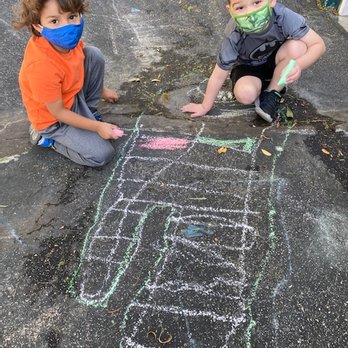 Devonshire Preschool & Infant Center - Drawing chalk skeletons for Halloween - Child Care & Day Care Near Me - Chatsworth, California Devonshire Preschool & Infant Center - Drawing chalk skeletons for Halloween - Child Care & Day Care Near Me - Chatsworth, California