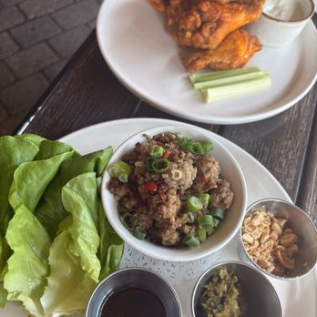 Our Place Kitchen & Bar - Buffalo wings and the lettuce wraps (messy but so delicious)! - Salad Near Me - Yorktown Heights, New York Our Place Kitchen & Bar - Buffalo wings and the lettuce wraps (messy but so delicious)! - Salad Near Me - Yorktown Heights, New York