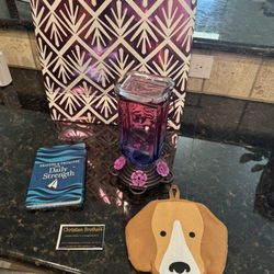 Christian Brothers Artisan Gallery & Consignment - We bought this cute hummingbird feeder, adorable potholder, and sweet little book.