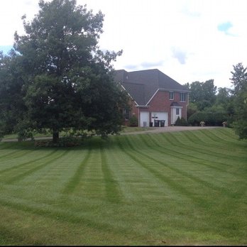 A2Z Lawn Services - a house in the background - Lawn Services Near Me - Ann Arbor, Michigan