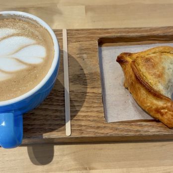 A Family - Dulce de leche latte and short rib empanada - Bakeries Near Me - Cooper City, Florida A Family - Dulce de leche latte and short rib empanada - Bakeries Near Me - Cooper City, Florida