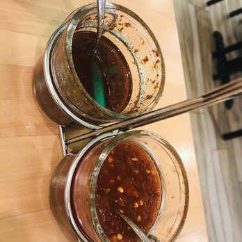 Pho Claire - Ask for chili oil! The slightly darker one is made in house and has a hint of lemongrass! - Vietnamese Near Me - Myrtle Beach, South Carolina Pho Claire - Ask for chili oil! The slightly darker one is made in house and has a hint of lemongrass! - Vietnamese Near Me - Myrtle Beach, South Carolina