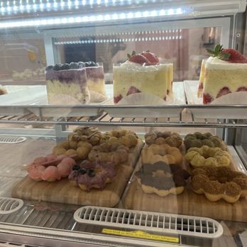 Donutchew - Display of the 12 types of donuts they sell and other pastries. - Donuts Near Me - Gaithersburg, Maryland