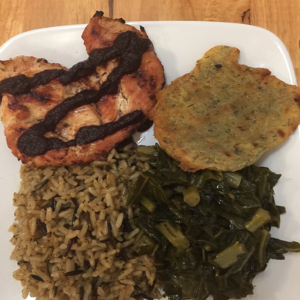 The Sidewalk Cafe - a plate of food with meat, rice, and greens - Coffee & Tea Near Me - Sumter, South Carolina The Sidewalk Cafe - a plate of food with meat, rice, and greens - Coffee & Tea Near Me - Sumter, South Carolina