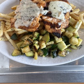 California Fish Grill - Atlantic salmon with butter garlic sauce. 2 sides French fries and rosemary zucchini - Seafood Near Me - Pasadena, California California Fish Grill - Atlantic salmon with butter garlic sauce. 2 sides French fries and rosemary zucchini - Seafood Near Me - Pasadena, California