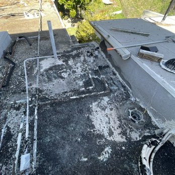 Hull Brothers Roofing - This is entirely Hull Borthers workmanship that leaked in four sections.  Its been waiting now 4 weeks for them to come out and seal this. - Roofing Near Me - Culver City, California