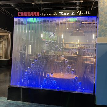 Caribana - a bar and grill with blue lights - Caribbean Near Me - Gurnee, Illinois