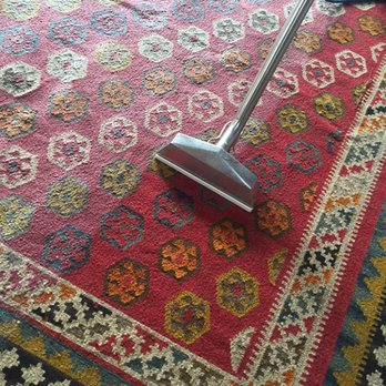 Advanced Carpet Cleaning & Floor Care - a person using a vacuum - Carpet Cleaning Near Me - Visalia, California Advanced Carpet Cleaning & Floor Care - a person using a vacuum - Carpet Cleaning Near Me - Visalia, California