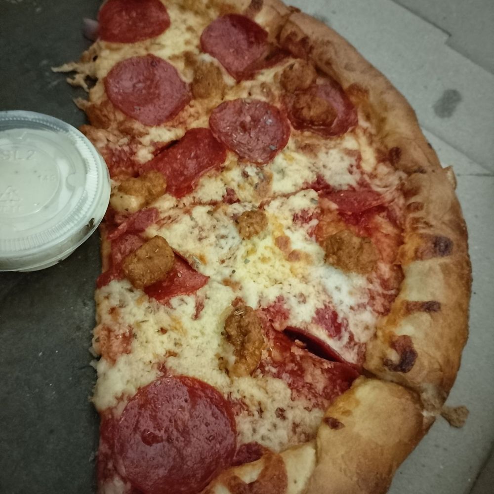 Pepperoni and sausage with the regular crust. Must get the creamy Italian dressing, complements the garlicy crust