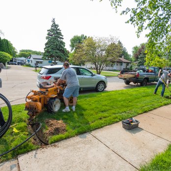 Oasis Irrigation Lawn - two men working on a hole - Landscaping Near Me - Taylor, Michigan Oasis Irrigation Lawn - two men working on a hole - Landscaping Near Me - Taylor, Michigan