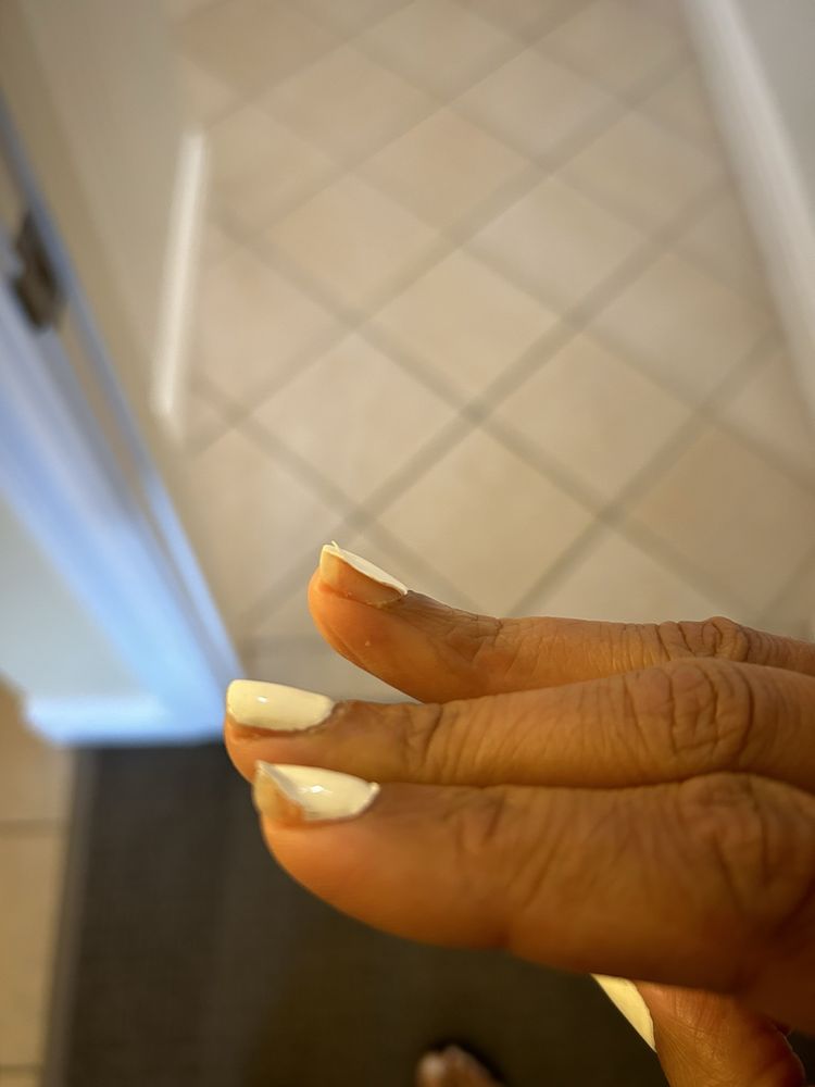 Tina's Nail Salon Logo