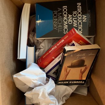 Puma Moving Company - This is how they pack books! It's no wonder they went 2x over their estimate on packing materials that they charged me for - Movers Near Me - San Francisco, California