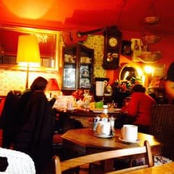The Old Cottage Coffee Shop - An interesting assortment of pictures and knickknacks around the shop