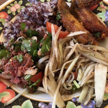 Palace's Pizza - Papaya, purple sticky rice, chicken wing with pepper sauce and raw beef laab - Pizza Near Me - Saint Paul, Minnesota Palace's Pizza - Papaya, purple sticky rice, chicken wing with pepper sauce and raw beef laab - Pizza Near Me - Saint Paul, Minnesota