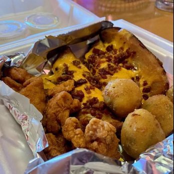 Texas Roadhouse - Combo appetizer that didnt come out on time: rattlesnake bites, potatoe skins, chicken chunks - Steakhouses Near Me - West Chester, Ohio Texas Roadhouse - Combo appetizer that didnt come out on time: rattlesnake bites, potatoe skins, chicken chunks - Steakhouses Near Me - West Chester, Ohio