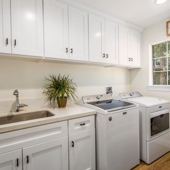 MJ Remodel - a washer and dryer in a kitchen - General Contractors Near Me - Riverside, California