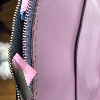 Tide Cleaners - Tide Cleaners' attempt to restore my bag after they ruined it. They even got paint on the zipper. - Dry Cleaning Near Me Tide Cleaners - Tide Cleaners' attempt to restore my bag after they ruined it. They even got paint on the zipper. - Dry Cleaning Near Me