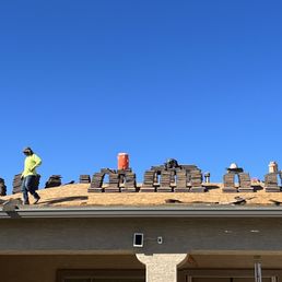 Roofers at work