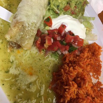 Sebastian's Taqueria - Green enchilada with al pastor pork and rice. - Mexican Near Me - Bakersfield, California
