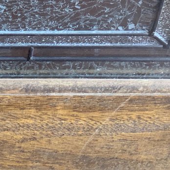 Optimized Painting - That is a scratch from a ladder that wasnt going to be an issue becasue the front door was going to be sanded and resealed. Yeah still waiti - Painters Near Me - Addison, Texas