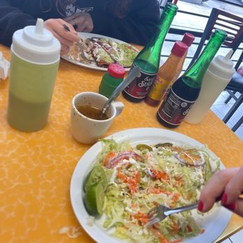 Cenaduria Dona Chayito - a woman eating a salad - Spanish Near Me - Glendale, Arizona Cenaduria Dona Chayito - a woman eating a salad - Spanish Near Me - Glendale, Arizona