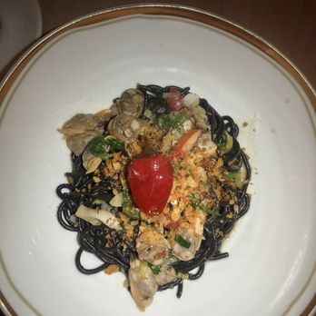 Santi - Squid ink pasta and clams, delicious - Italian Near Me - New York, New York Santi - Squid ink pasta and clams, delicious - Italian Near Me - New York, New York