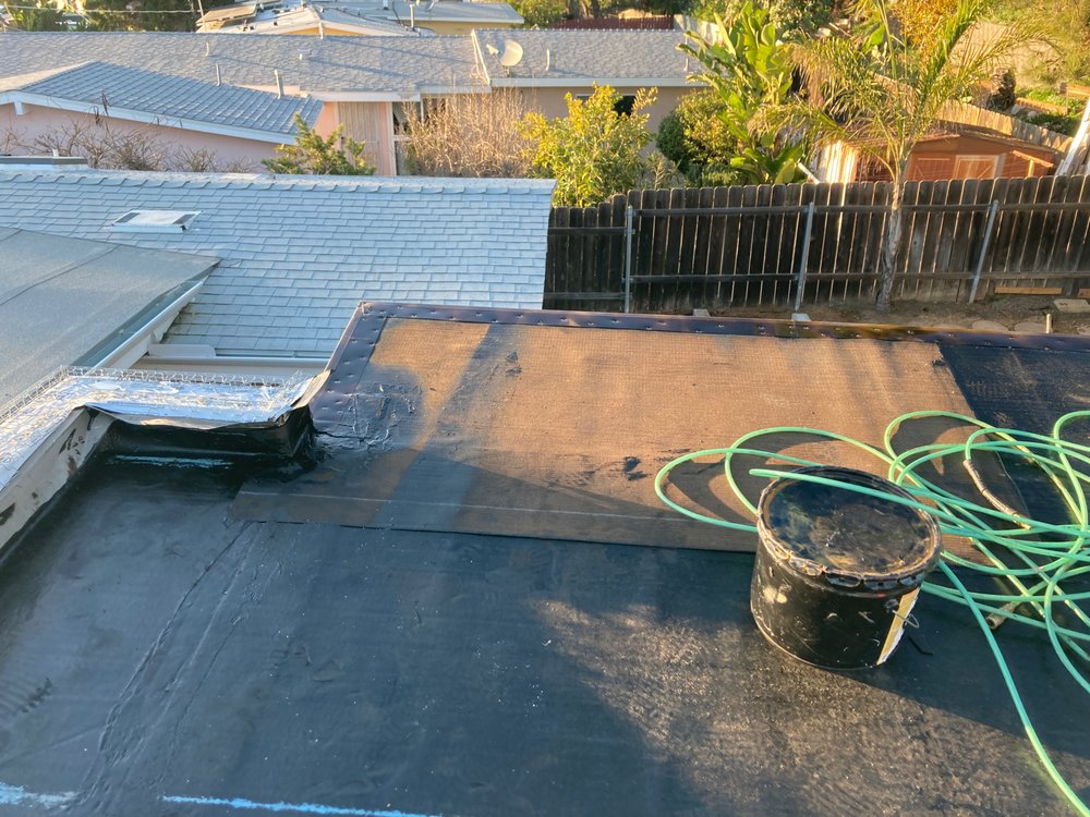 Slide of jauregui's roofing