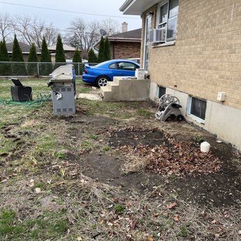 AI Elite Home Development - Back yard before patio. - General Contractors Near Me
