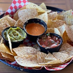 The Side Door Saloon - This is absolutely amazing! Chips and salsa, guacamole, and queso cheese sauce.