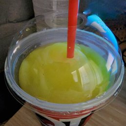 a drink in a plastic cup with a straw a drink in a plastic cup with a straw