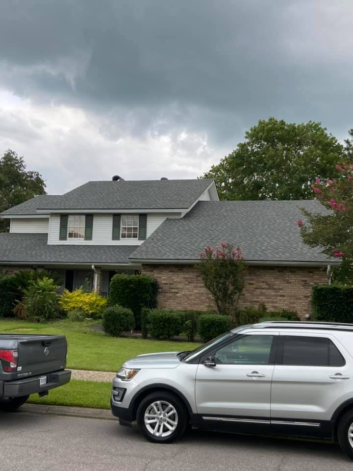 Slide of John Theriots Roofing