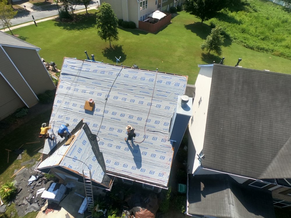 Slide of Rhino Roofing & Construction