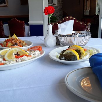 Istanbul Blue - three plates of food and a glass of water - Mediterranean Near Me - Vienna, Virginia Istanbul Blue - three plates of food and a glass of water - Mediterranean Near Me - Vienna, Virginia