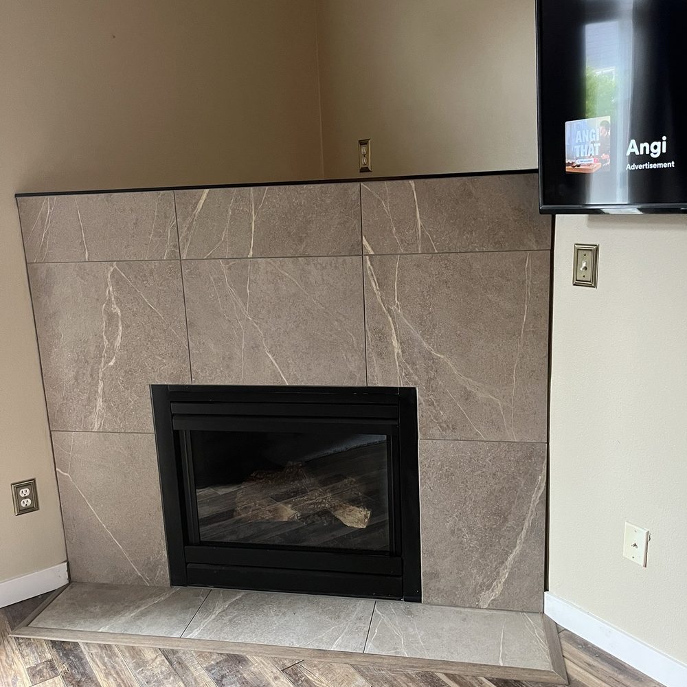 Paliy Renovation - Newly tiled fireplace - General Contractors Near Me - Vancouver, Washington