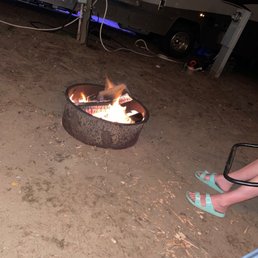 Fire pit and the luxurious 17feet of space between campers. Fire pit and the luxurious 17feet of space between campers.