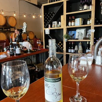 Larue Winery - a bottle of wine and two glasses of wine - Wineries Near Me - Lewisville, Texas Larue Winery - a bottle of wine and two glasses of wine - Wineries Near Me - Lewisville, Texas